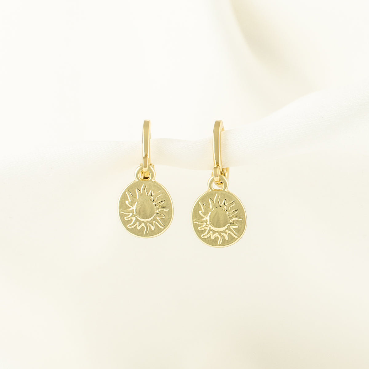 Cyrus Sun Huggie Earrings