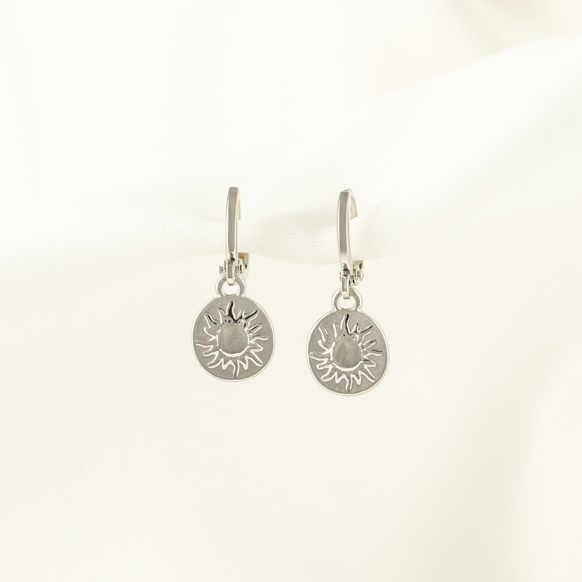 Cyrus Sun Huggie Earrings