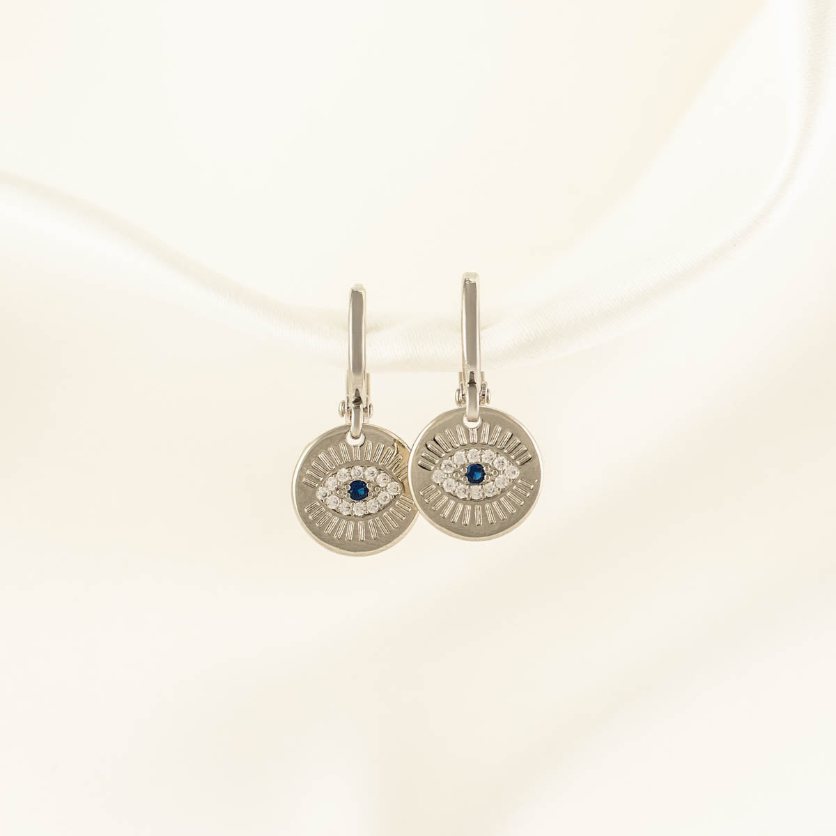 Sigrid Evil Eye White and Blue Zircon Huggie Earrings