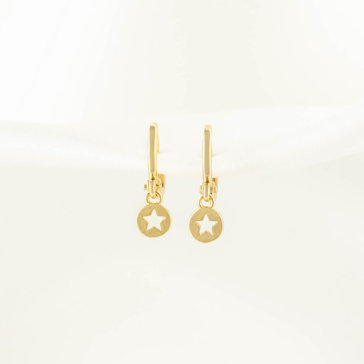 Tara Star Huggie Earrings