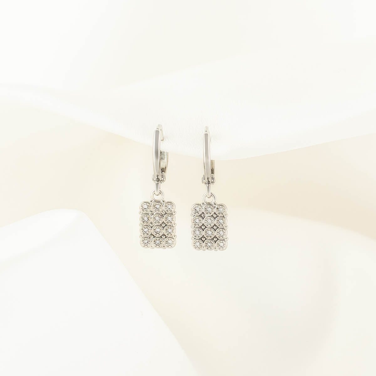 Xena White Zircon Huggie Earrings