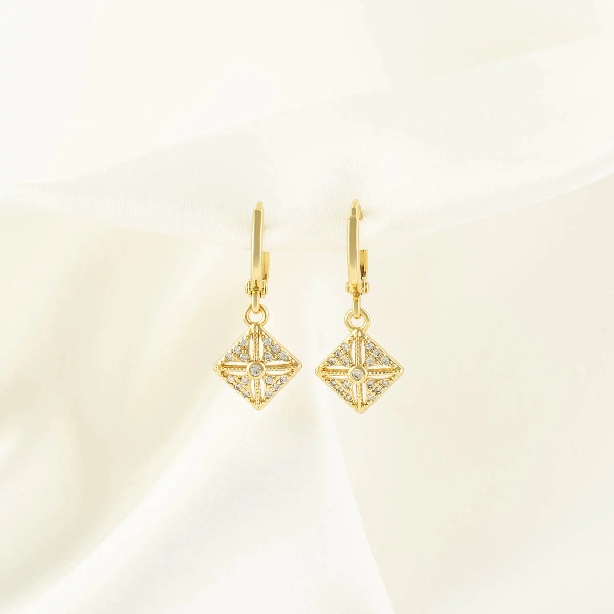 Kendra Diamond White Zircon Huggie Earrings