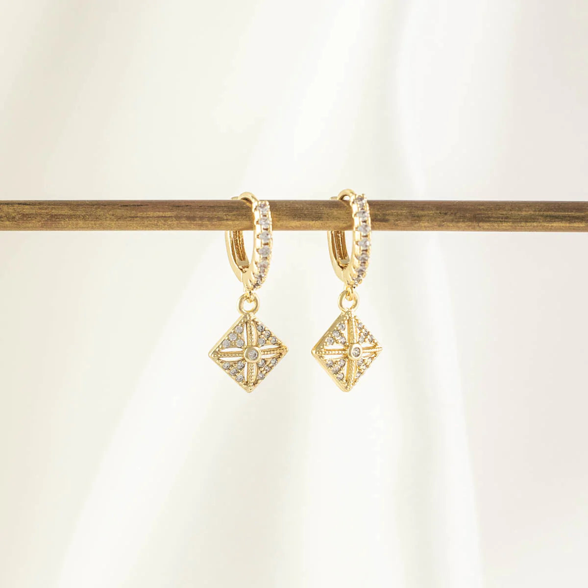 Kendra Diamond White Zircon Embellished Huggie Earrings