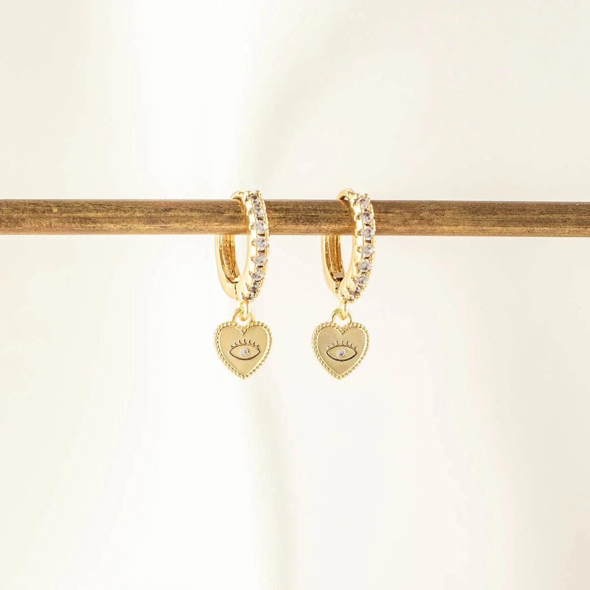 Valerie Evil Eye Heart White Zircon Embellished Huggie Earrings