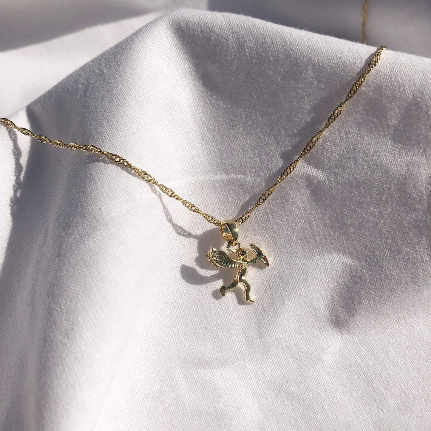 Gold Cupid Pendant Necklace