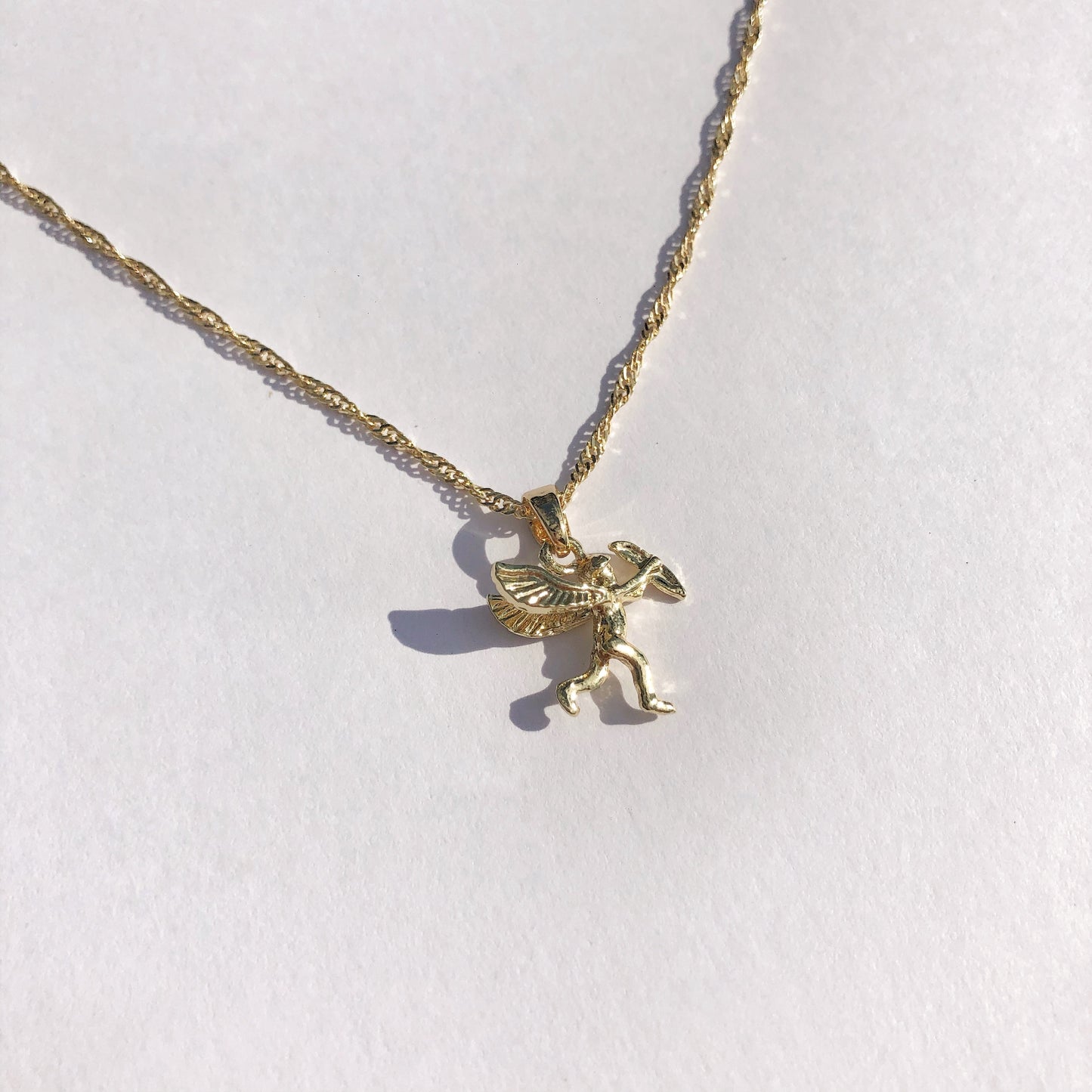 Gold Cupid Pendant Necklace