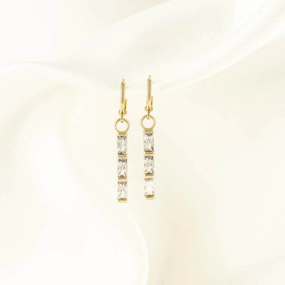 Cora White Zircon Huggie Earrings